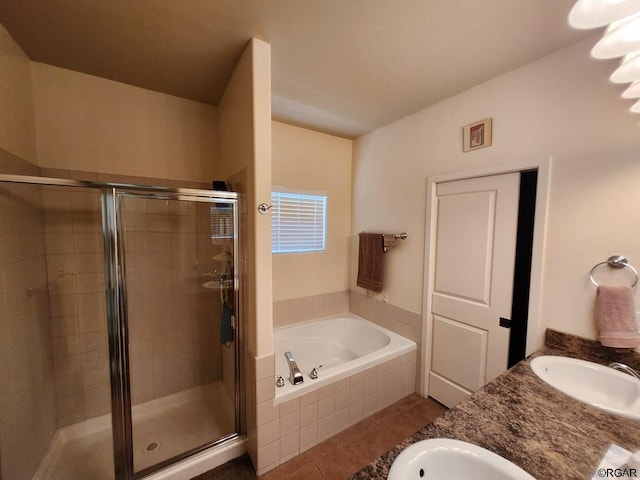 bathroom with vanity, separate shower and tub, and tile patterned flooring