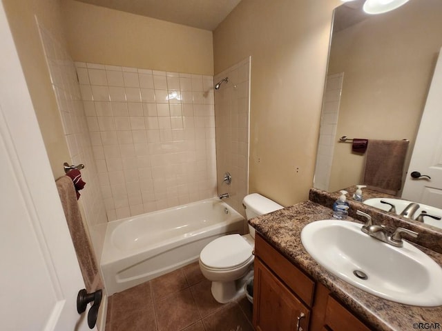 full bathroom featuring tile patterned flooring, vanity, toilet, and washtub / shower combination