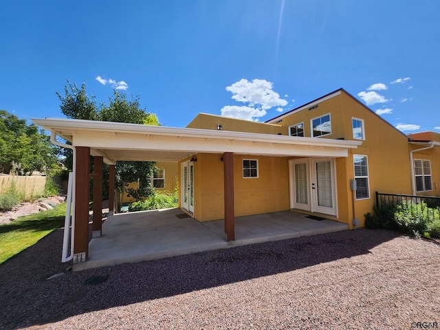 back of house with french doors