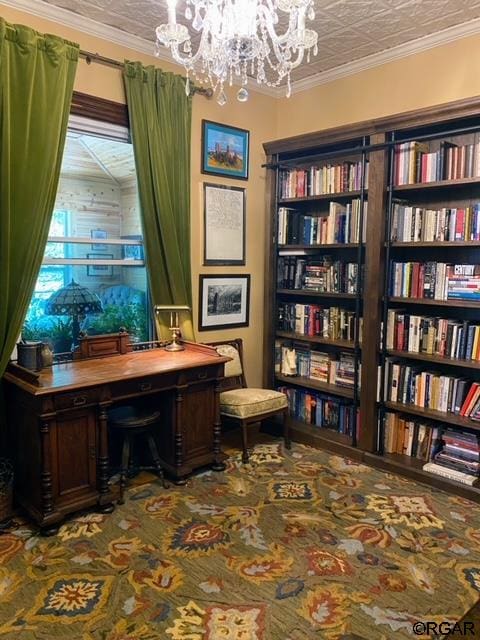 home office with ornamental molding and a chandelier