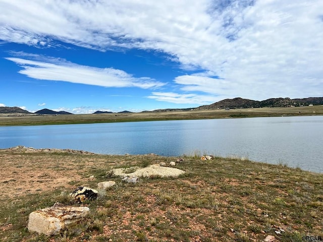 property view of water featuring a mountain view