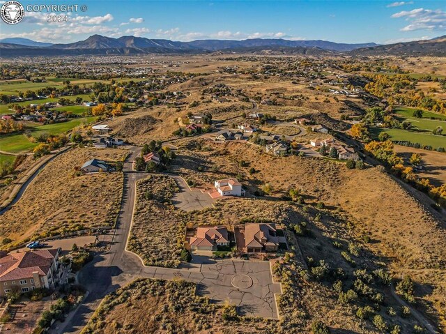 bird's eye view with a mountain view