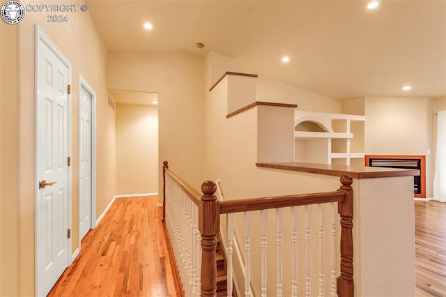 corridor featuring light hardwood / wood-style floors