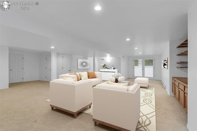 living room featuring light colored carpet