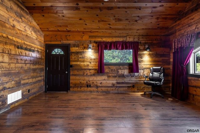 unfurnished room featuring wood ceiling, vaulted ceiling, and plenty of natural light