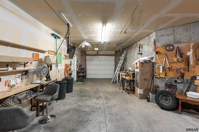 garage featuring a workshop area