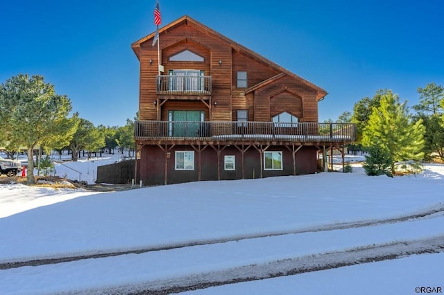 view of front of home with a balcony