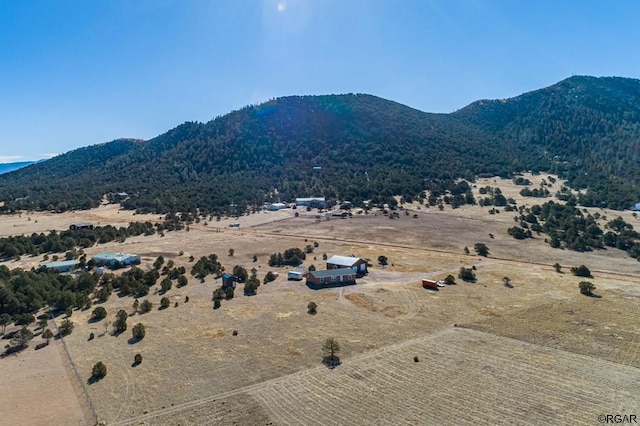 view of mountain feature with a rural view