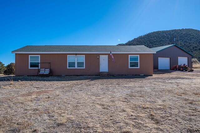 view of front facade with a mountain view