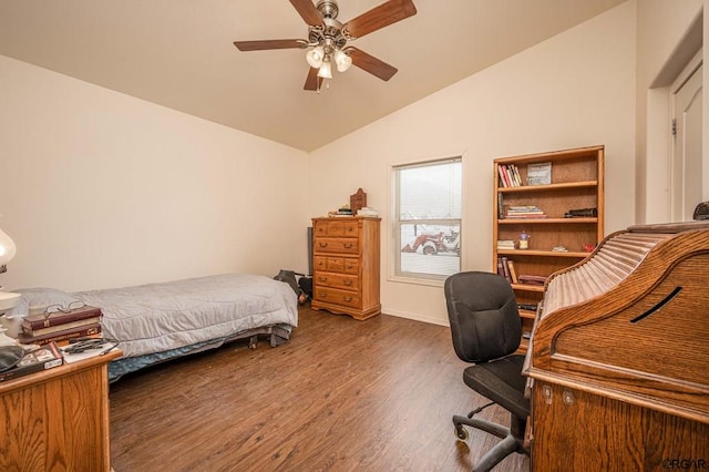 bedroom featuring vaulted ceiling, dark hardwood / wood-style flooring, and ceiling fan