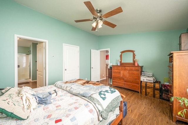 bedroom with ceiling fan, ensuite bathroom, and hardwood / wood-style floors