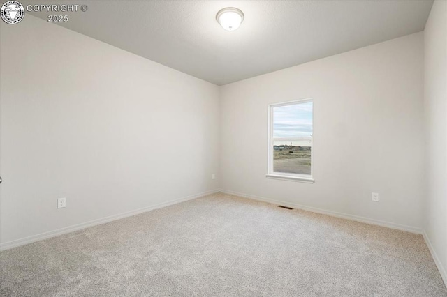 unfurnished room with carpet