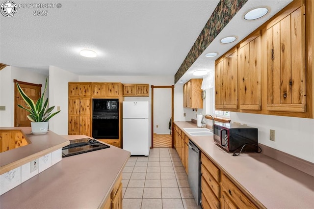 161 Shannon Rd, Cotopaxi, CO 81223 - kitchen featuring black appliances, a textured ceiling, light countertops, and light tile patterned flooring
