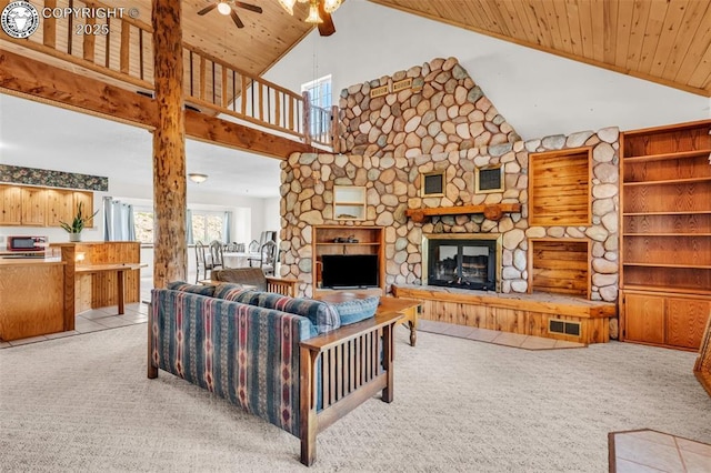 161 Shannon Rd, Cotopaxi, CO 81223 - living area with ceiling fan, light colored carpet, high vaulted ceiling, wood ceiling, and a fireplace
