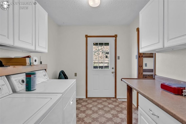 161 Shannon Rd, Cotopaxi, CO 81223 - laundry room with washing machine and dryer, cabinet space, light floors, and a textured ceiling