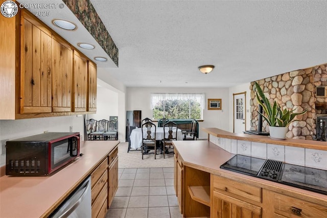 161 Shannon Rd, Cotopaxi, CO 81223 - kitchen with black appliances, a textured ceiling, open shelves, brown cabinets, and light countertops