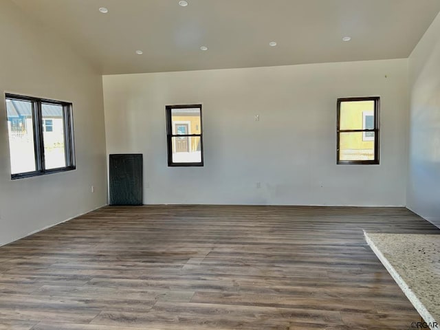 spare room featuring hardwood / wood-style floors