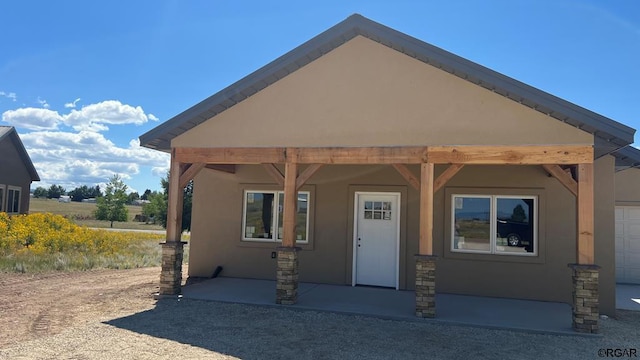 view of front of home featuring a patio area