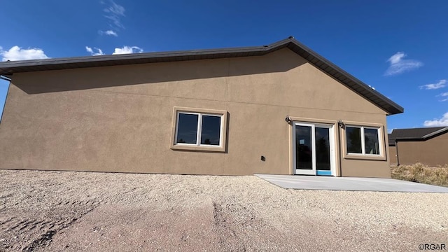 rear view of house with a patio area