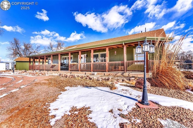 view of front of home featuring covered porch