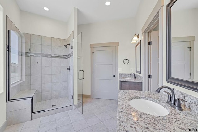 117 Rocchio Dr, Florence, CO 81226 - bathroom featuring a stall shower, recessed lighting, a sink, tile patterned flooring, and two vanities
