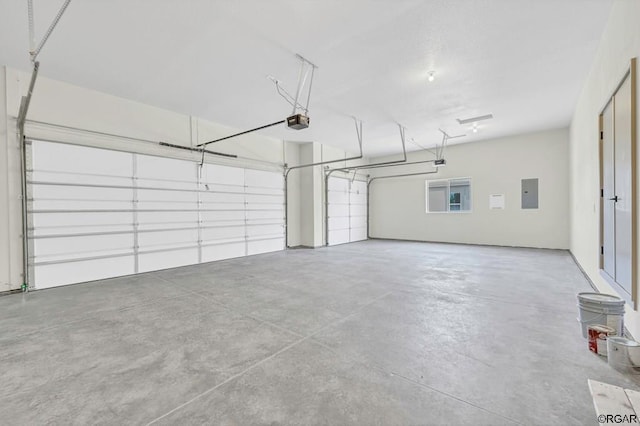 117 Rocchio Dr, Florence, CO 81226 - garage with electric panel and a garage door opener