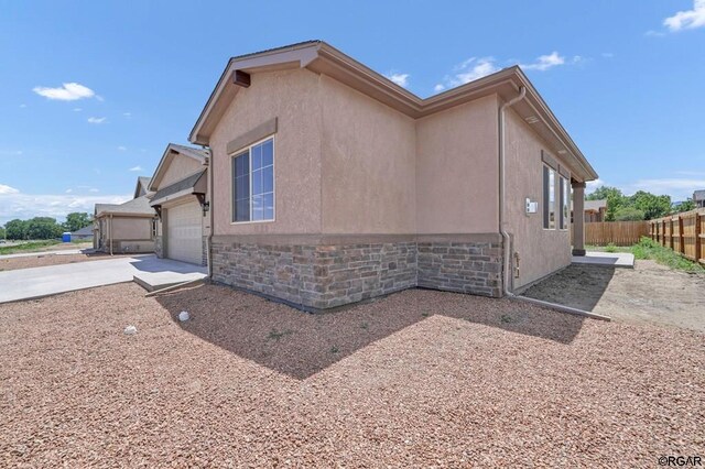 view of home's exterior with a garage