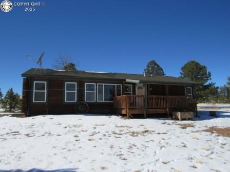 view of front of house with a wooden deck