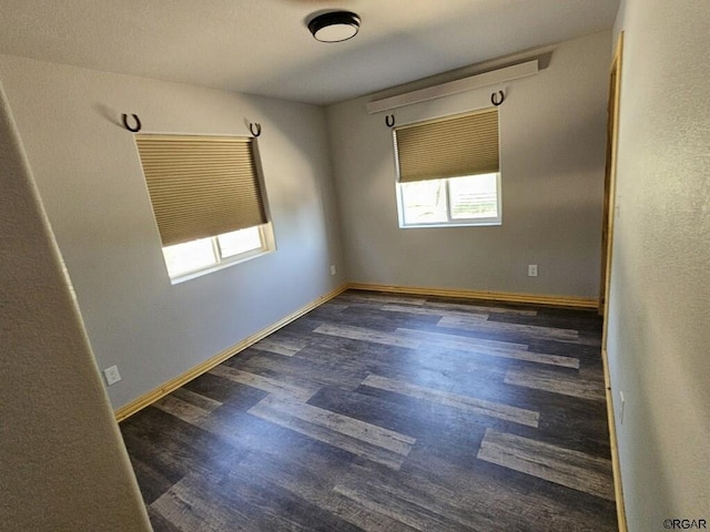 760 D St, Penrose, CO 81240 - unfurnished room with baseboards and wood finished floors