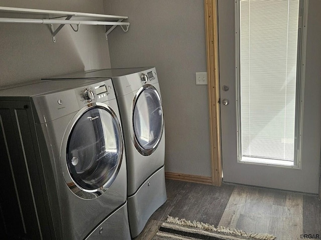 760 D St, Penrose, CO 81240 - washroom with baseboards, dark wood-style floors, laundry area, and washing machine and clothes dryer