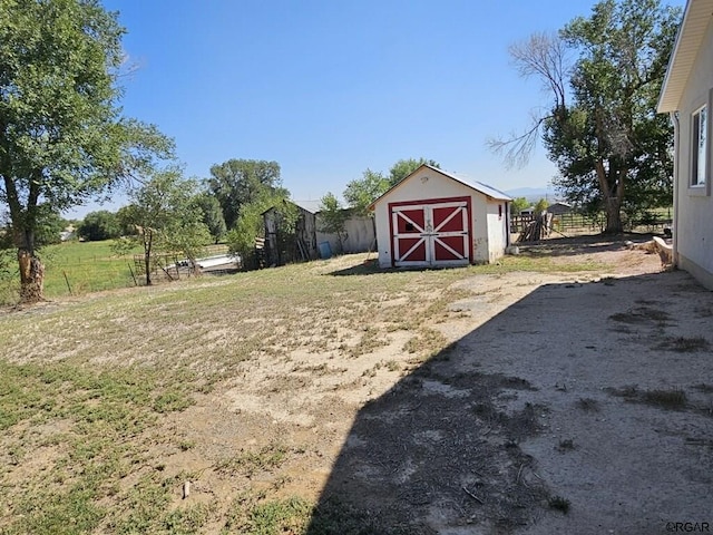 760 D St, Penrose, CO 81240 - view of yard with an outbuilding, fence, and a shed
