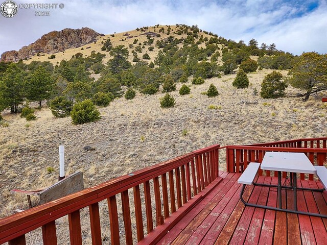 297 S Matterhorn Cir, Westcliffe, CO 81252 - wooden terrace with a mountain view