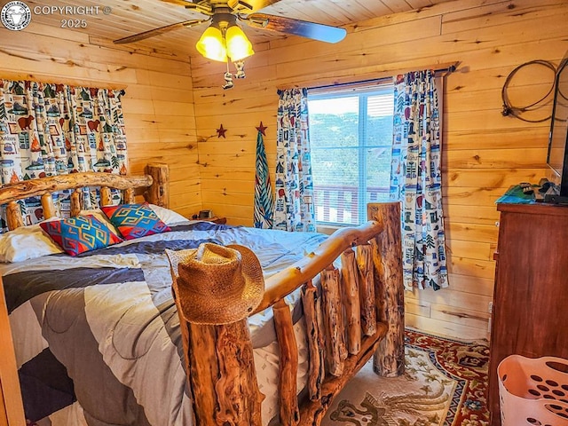 297 S Matterhorn Cir, Westcliffe, CO 81252 - bedroom with a ceiling fan, wooden walls, and wood ceiling