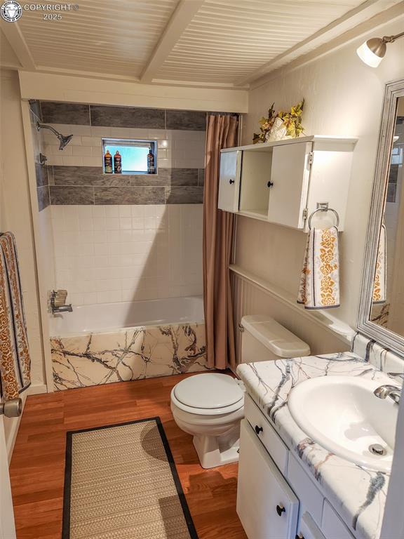 600 Raintree Blvd Unit 99, Canon City, CO 81212 - full bath featuring wood finished floors, vanity, and shower / bath combo