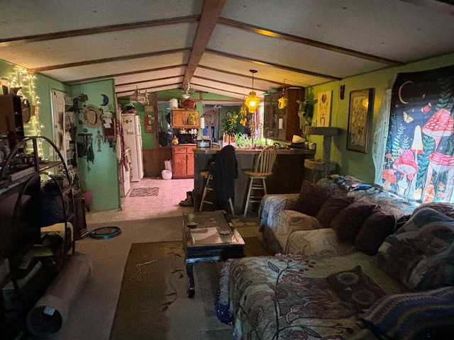 misc room featuring lofted ceiling with beams