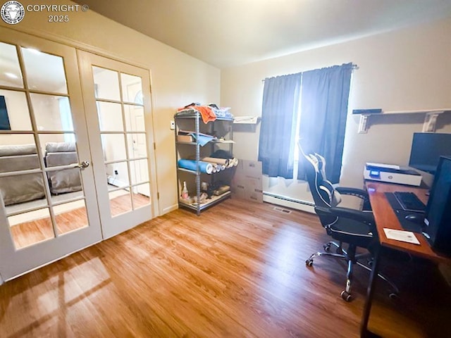 2794 Elizabeth St, Canon City, CO 81212 - home office with wood finished floors, french doors, and baseboard heating