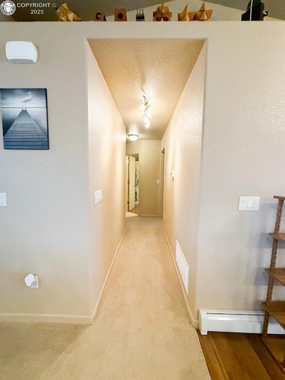 2794 Elizabeth St, Canon City, CO 81212 - hall with baseboards and baseboard heating