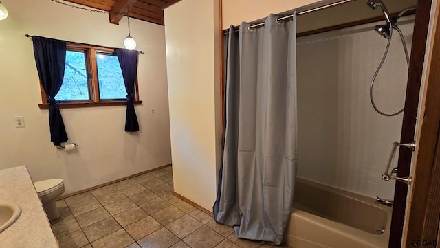 full bathroom featuring tile patterned floors, vanity, toilet, and shower / tub combo