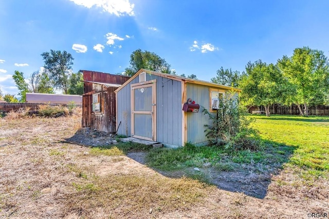 view of outdoor structure featuring a yard