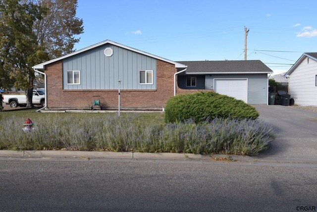 ranch-style house with a garage