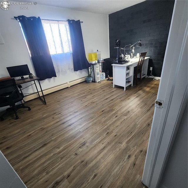 office featuring dark hardwood / wood-style flooring and baseboard heating