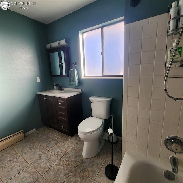 bathroom featuring baseboard heating, vanity, and toilet