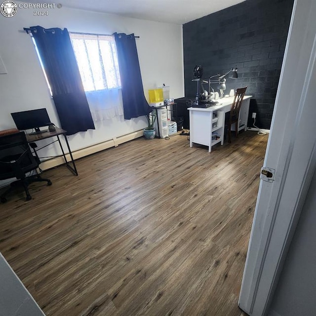 office area featuring dark hardwood / wood-style flooring and a baseboard radiator