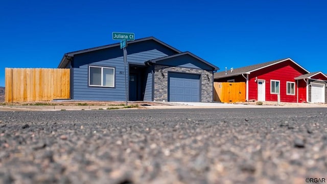 ranch-style home with a garage