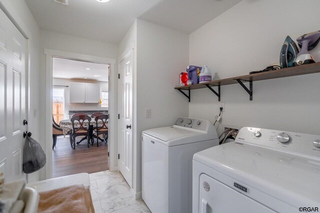 laundry area with washer and dryer