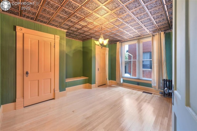 417 Greenwood Ave, Canon City, CO 81212 - empty room with an ornate ceiling and wood finished floors