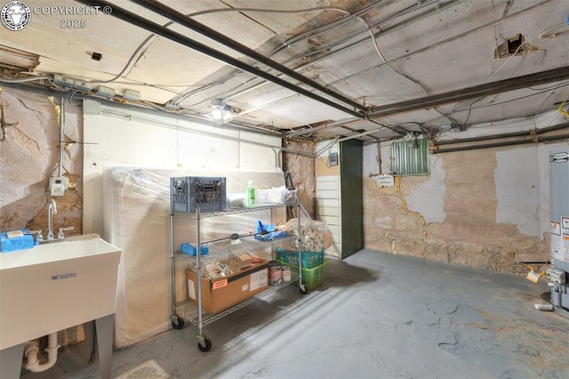 417 Greenwood Ave, Canon City, CO 81212 - unfinished basement with a sink and water heater