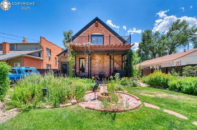 417 Greenwood Ave, Canon City, CO 81212 - back of house featuring brick siding and a balcony
