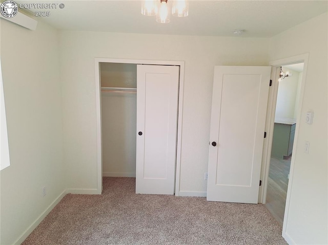 138 Jerry Dr, Westcliffe, CO 81252 - unfurnished bedroom featuring baseboards, a closet, carpet floors, and a chandelier