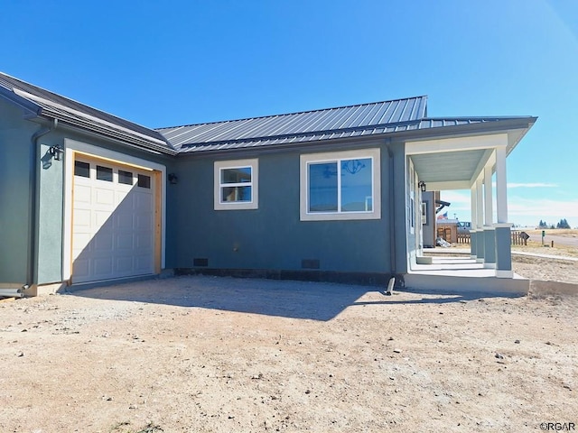 exterior space featuring a garage